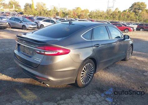 2018 Ford Fusion Hybrid Titanium из США, поврежденный, VIN 3FA6P0RU7JR249138